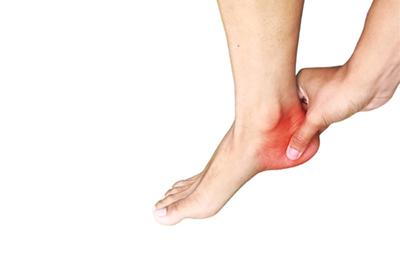 Illustration-of-heel-pain-in-red-highlights-holds-by-hand.
