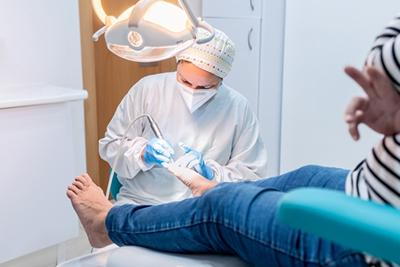 Patient-with-Foot-Conditions-Seeks-Podiatrist-Help