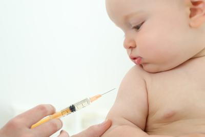 Immunization-vaccine-to-be-injected-in-little-baby.