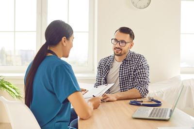 Gastroenterologist-with-Patient-During-Diagnosis-of-Food-Intolerance
