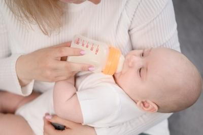 Illustration of Formula Feeding on baby