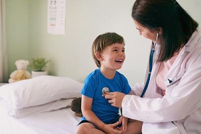 Pediatrician-Checking-Child's-Hearbeat