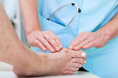 Podiatrist-Checking-Patient's-Bunion