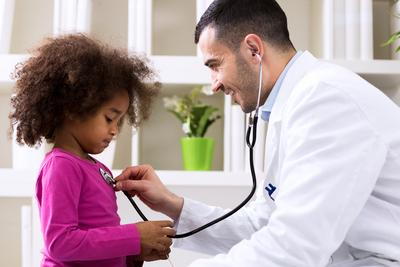 Little-boy-is-checkup-by-doctor-in-clinic-for-the-first-time.
