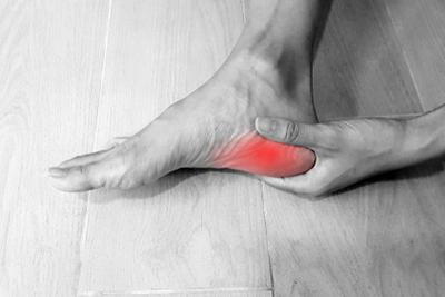 Lady-Holding-her-Painful-Heel