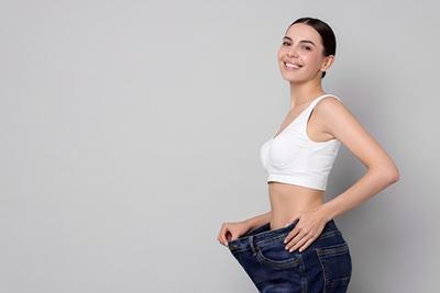Happy-Young-Woman-Loses-Weight