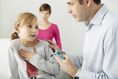 Pediatrician-Discussing-Breathing-Concerns-with-Child