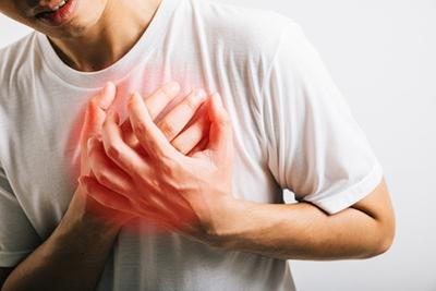 Adult male suffering from chest pain