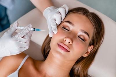 Woman undergoing Botox treatment for facial aesthetics