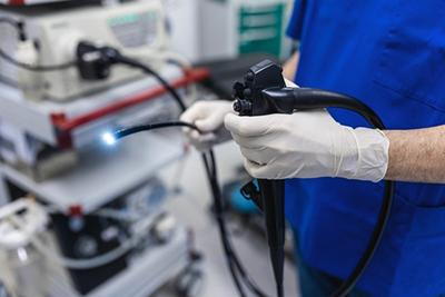 Gastroenterologist-Holding-Colonoscope