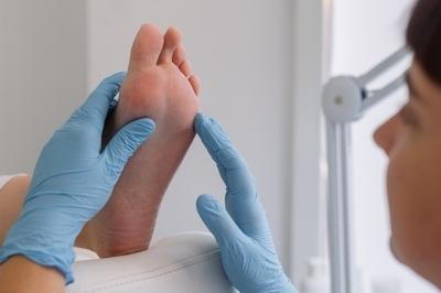 Podiatrist checking the foot condition