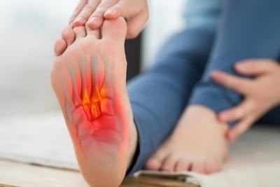 Foot pain in 3d image of bone with redness.