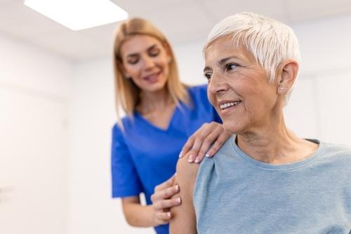 Female client receiving osteopathy treatment
