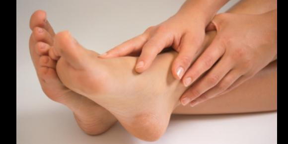 causes of bone spurs in feet