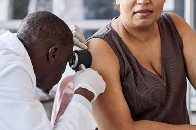 Doctor checking the skin condition of patients on clinic