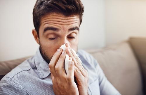 Man suffering from nasal congestion