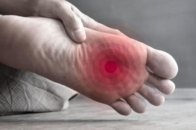 Foot in pain in red circular highlights