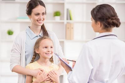 Parent accompanying child during pediatric health check