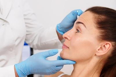 Skin-Doctor-Looking-for-Viable-Treatments-for-Patient's-Wrinkles