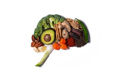 Healthy diet concept with brain-shaped food arrangement.