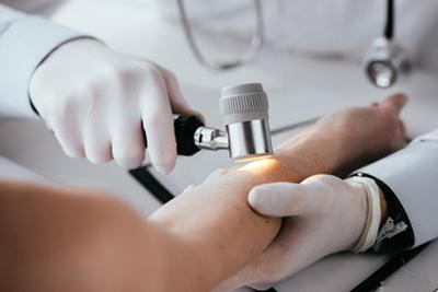 Patient's-Skin-Being-Inspected-with-Dermatoscope