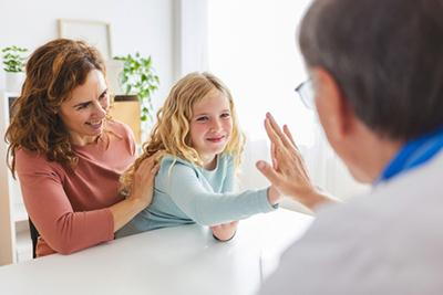 GIrl-with-Her-Mother-Visiting-The-Pediatrician