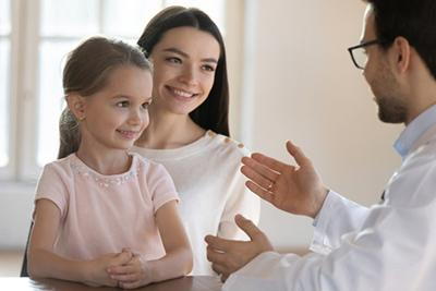 Mom-Brings-Child-to-Pediatrician-for-Wellness-Check