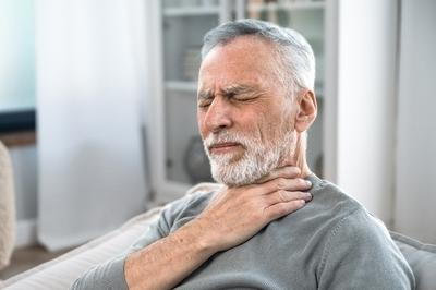 Man suffering in Swallowing difficulty