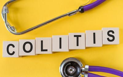 Concept image of colitis labeled in blocks