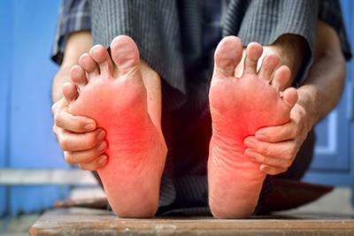 Man suffering in Plantar facitiis conditions