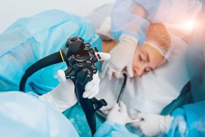 Endoscopy thru the patient while lying down in clinical bed.