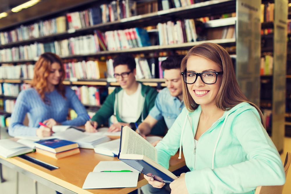 Woman wearing glasses at school library