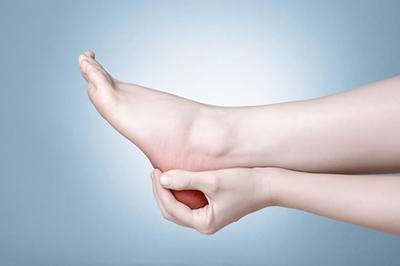 Person suffering from heel pain.