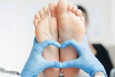 Podiatrist checking the balance of the feet