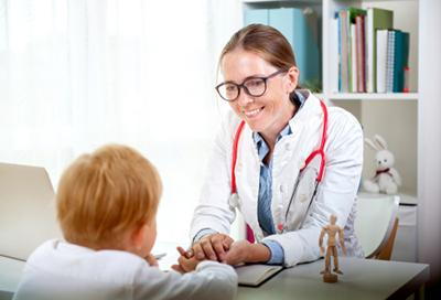 Young boy visiting the doctor on clinic