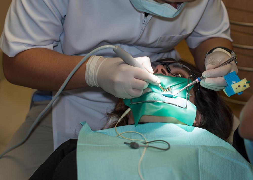 Man getting root canal surgery.