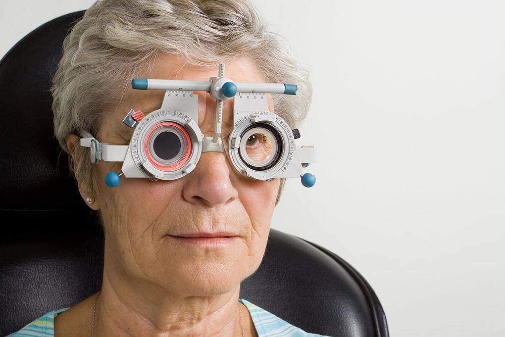senior woman getting eye care