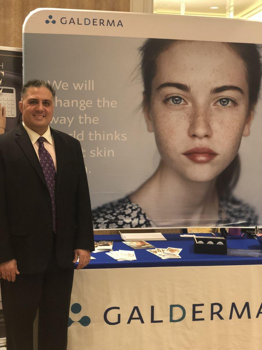 Dr. Alex at the Galderma booth