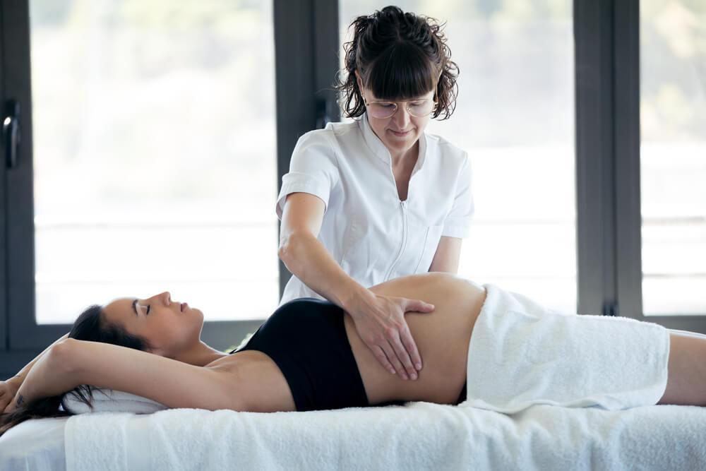 pregnant woman during chiropractic treatment