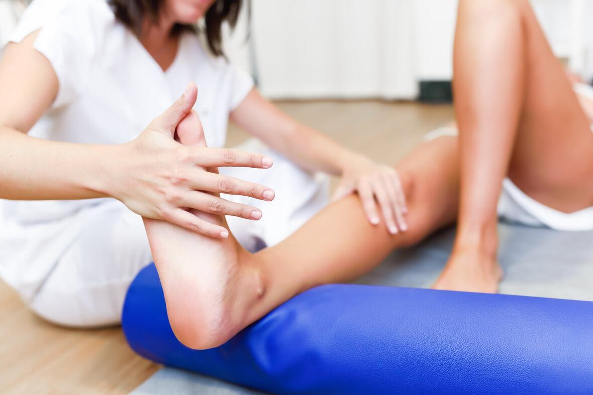 a chiropractor helping patient with joint pain