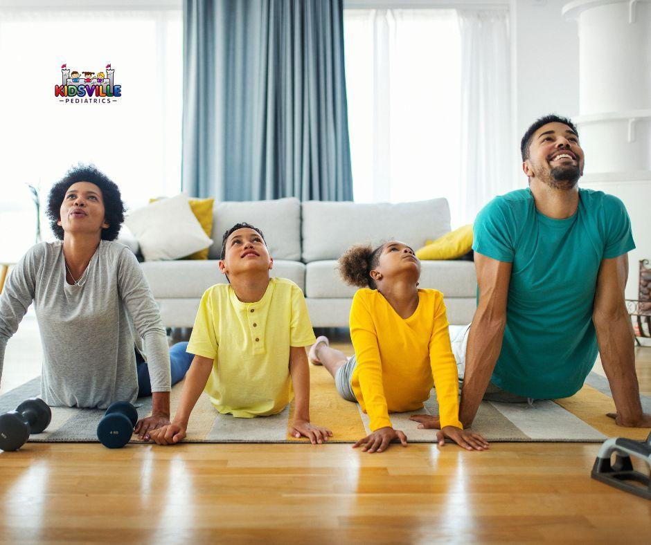 A family practicing yoga together in their living room.