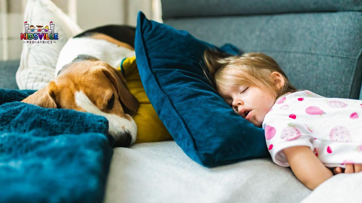 A peaceful scene of a little girl sleeping soundly on a bed, cuddled up next to a loyal dog.