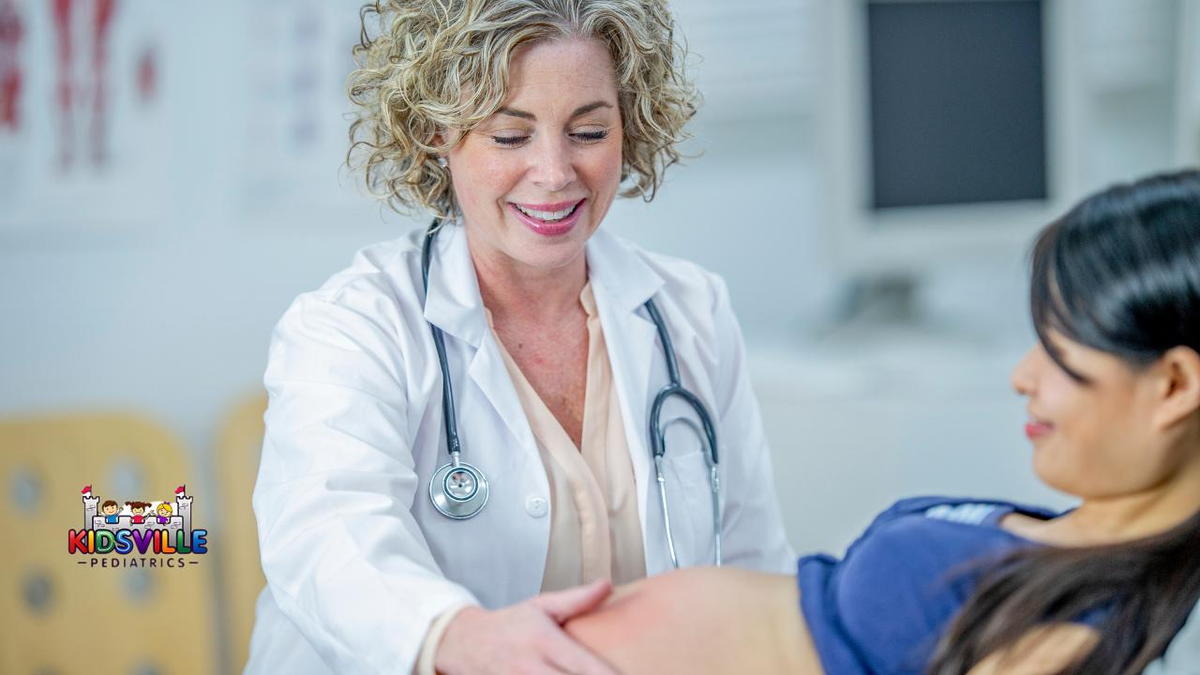 A woman undergoing a medical examination by a doctor in a clinical setting, focused on her pre-natal assessment.