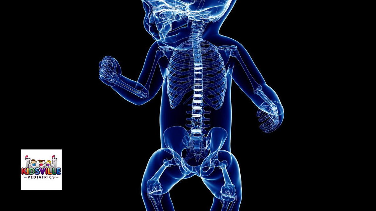 A baby skeleton illuminated by a soft blue light.