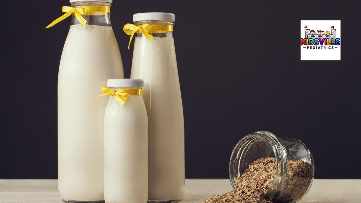 Fresh milk in glass bottles, each tied with a bright yellow ribbon, creating a charming and appealing display.