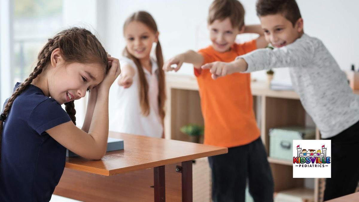 A group of kids verbally bullying a girl classmate.