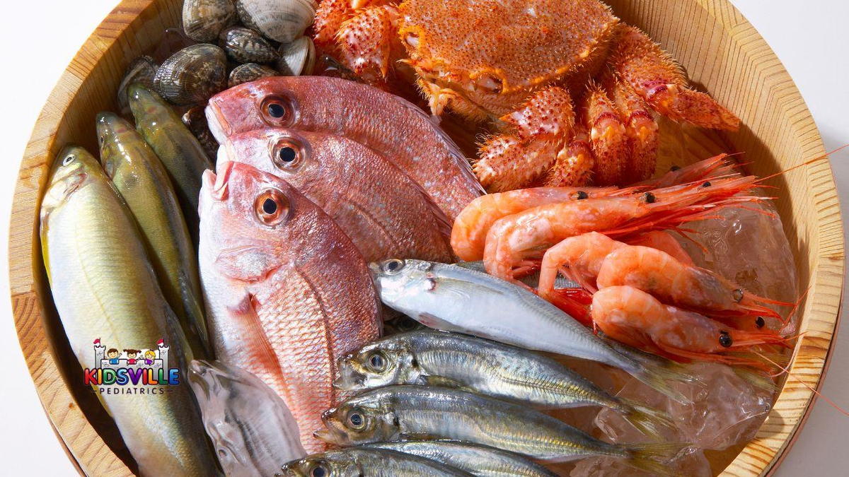 A wooden bowl brimming with an assortment of fresh seafood, showcasing shrimp, mussels, and fish.