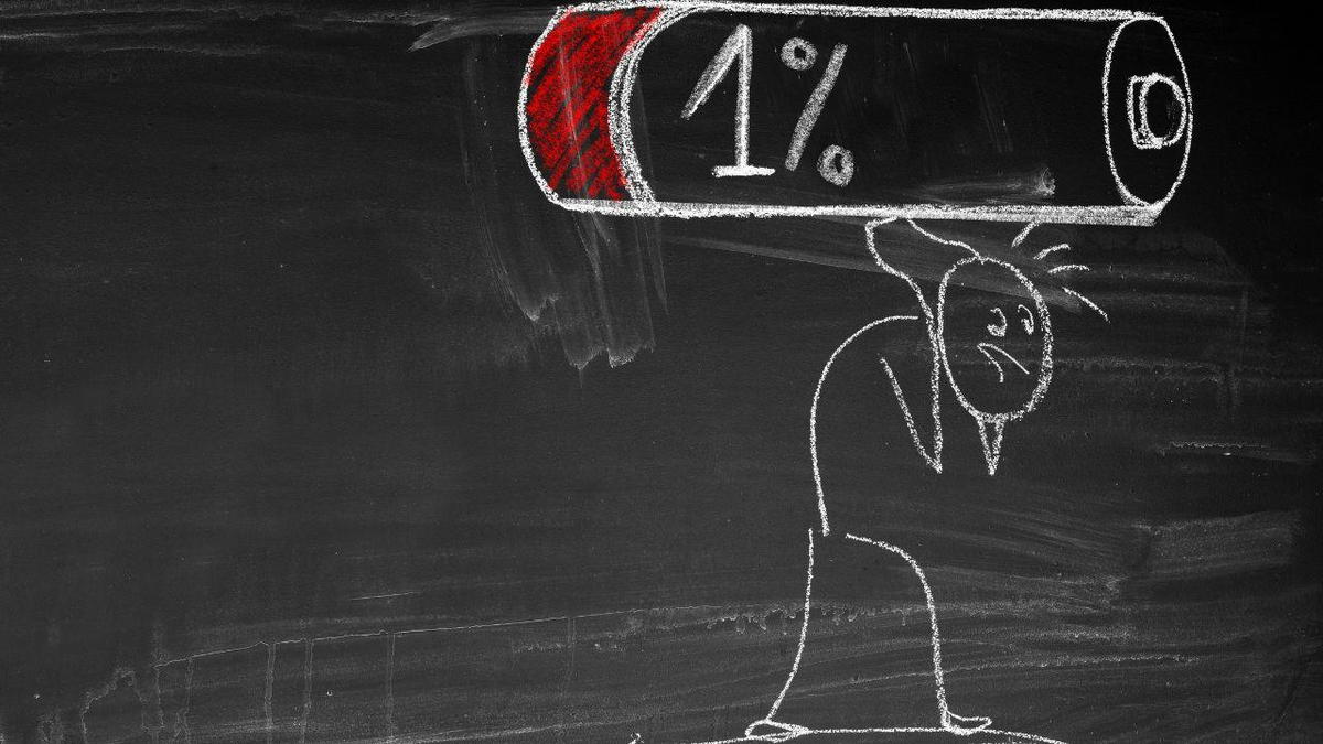 Blackboard illustration of a kid carrying a battery with just 1% charge left.