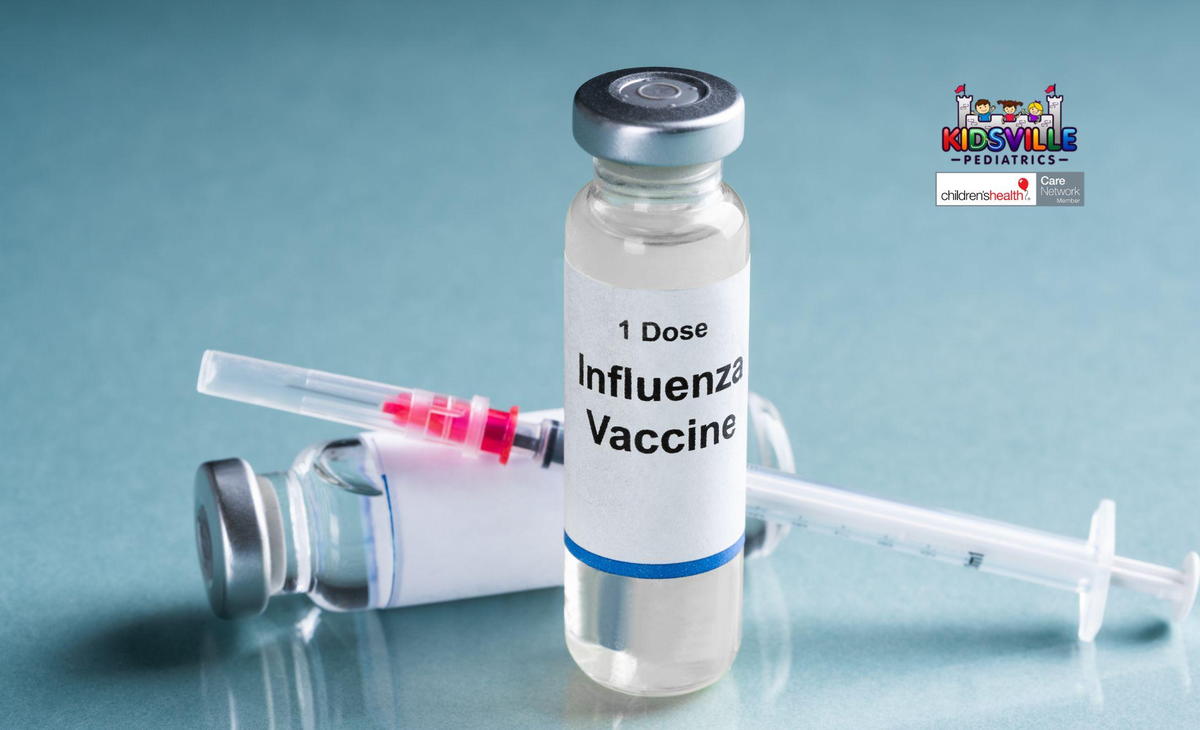 Two single-dose vials of influenza vaccine and a syringe.