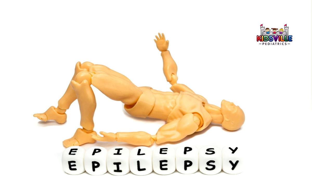 A human figure beside blocks of letter spelling out, epilepsy.